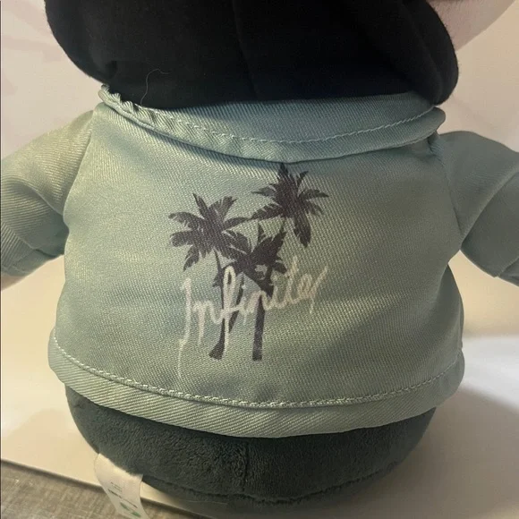 Charming Plush Toy with Brown Hair and Green Jacket - Picture 3 of 5